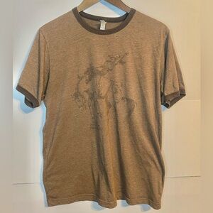 Bella + Canvas The Coyote Cowgirl Brown graphic T-shirt Yellowstone Western L